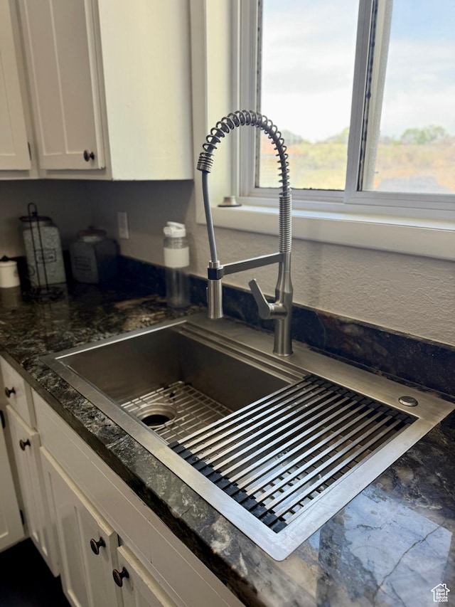 130 S 500 W, Roosevelt, UT 84066 - kitchen view of a sink and white cabinets