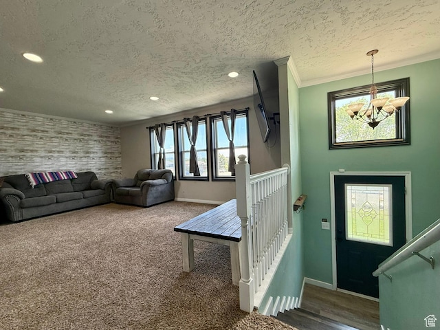 130 S 500 W, Roosevelt, UT 84066 - carpeted living room with a chandelier, baseboards, a textured ceiling, recessed lighting, and ornamental molding