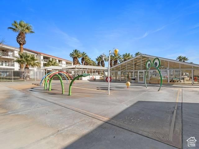 view of community featuring fence