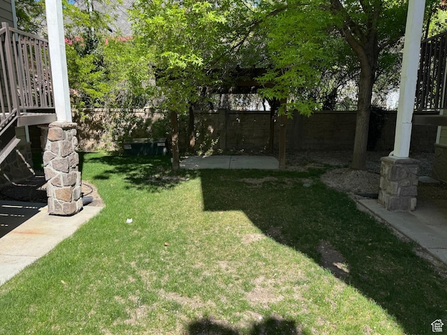view of yard with a fenced backyard