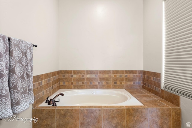 bathroom with a garden tub