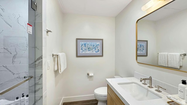 3000 Canyons Resort Dr Unit 4600, Park City, UT 84098 - bathroom featuring baseboards, toilet, a shower, vanity, and wood finished floors