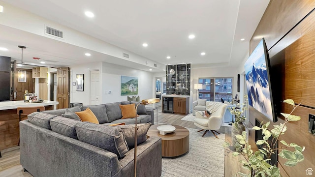 3000 Canyons Resort Dr Unit 4600, Park City, UT 84098 - living room with recessed lighting, light wood-type flooring, visible vents, and beverage cooler