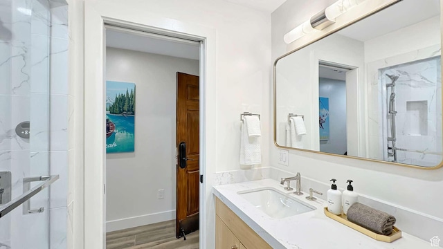 3000 Canyons Resort Dr Unit 4600, Park City, UT 84098 - bathroom with vanity, baseboards, walk in shower, and wood finished floors