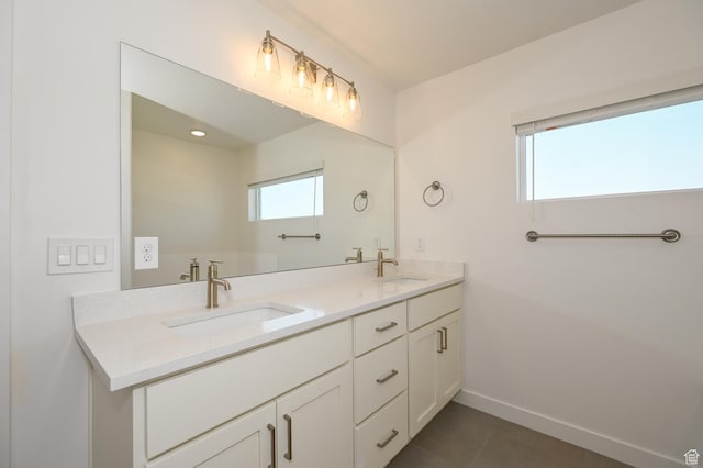 578 S 1080 W, American Fork, UT 84003 - full bathroom with tile patterned floors, double vanity, a sink, and baseboards