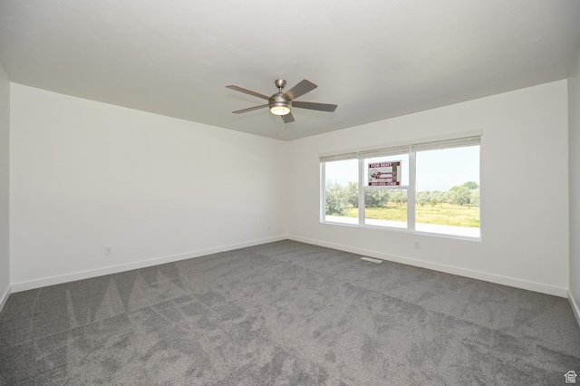 578 S 1080 W, American Fork, UT 84003 - empty room featuring visible vents, dark carpet, ceiling fan, and baseboards