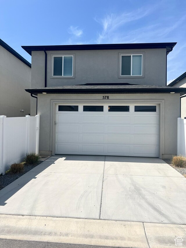 578 S 1080 W, American Fork, UT 84003 - view of front facade with concrete driveway, stucco siding, and a garage