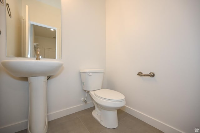 578 S 1080 W, American Fork, UT 84003 - half bathroom featuring toilet, baseboards, and tile patterned flooring