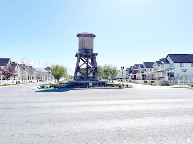 172 E Legacy Pkwy, Saratoga Springs, UT 84045 - view of street with curbs, sidewalks, traffic signs, and a residential view