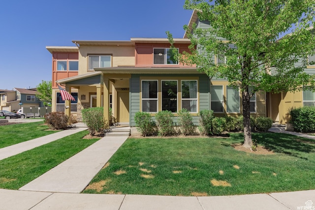 prairie-style home with a front yard