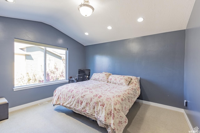 bedroom with recessed lighting, carpet flooring, visible vents, and lofted ceiling