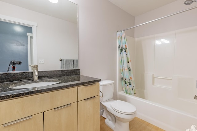 full bath featuring shower / tub combo, vanity, toilet, and wood finished floors