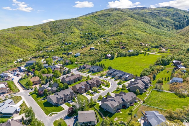 aerial view featuring a mountain view and a residential view