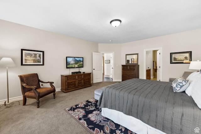 bedroom with carpet flooring and baseboards
