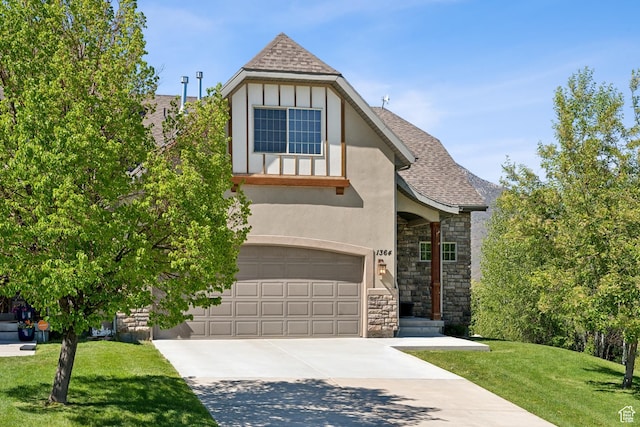 english style home with stucco siding, driveway, stone siding, a garage, and a shingled roof
