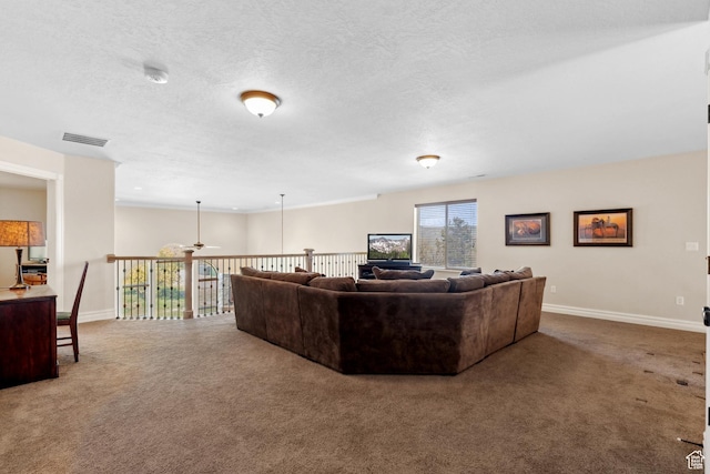 living area with baseboards, a textured ceiling, a ceiling fan, visible vents, and carpet