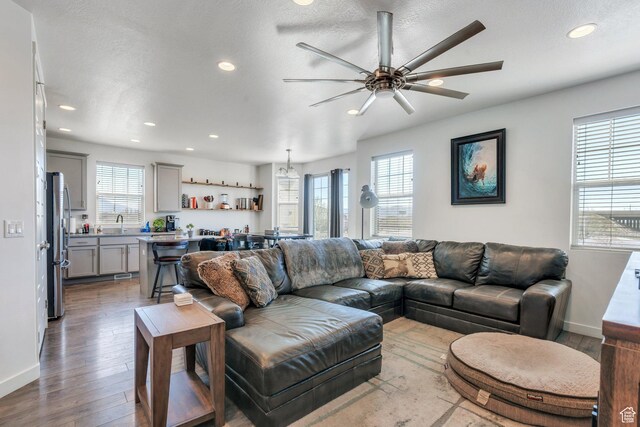 42 S 1060 W, Spanish Fork, UT 84660 - living room with a ceiling fan, plenty of natural light, and recessed lighting