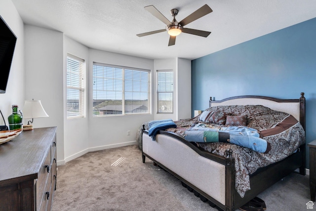 42 S 1060 W, Spanish Fork, UT 84660 - bedroom featuring baseboards, multiple windows, ceiling fan, and light colored carpet