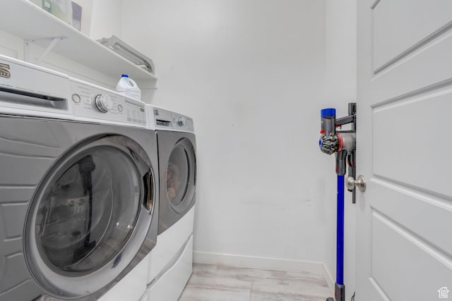 42 S 1060 W, Spanish Fork, UT 84660 - laundry area with baseboards, separate washer and dryer, and laundry area