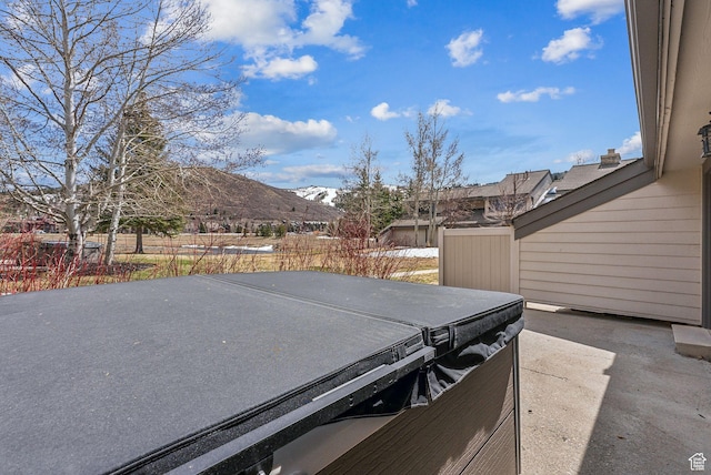 1450 Deer Valley Dr N, Park City, UT 84060 - view of yard with a patio, a mountain view, fence, and a hot tub