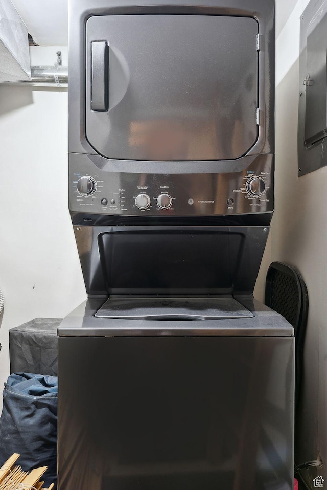 1450 Deer Valley Dr N, Park City, UT 84060 - clothes washing area featuring stacked washer and clothes dryer, laundry area, and electric panel