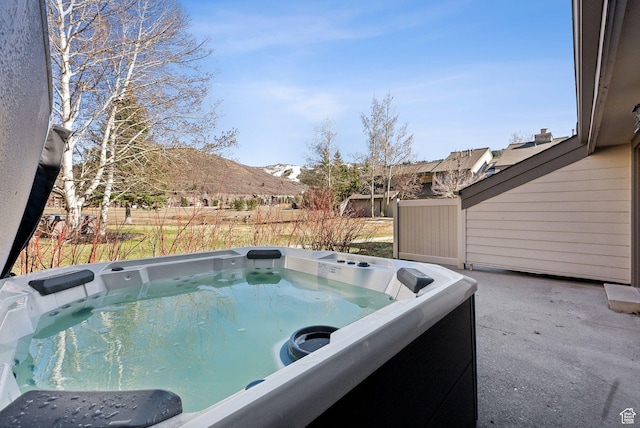 1450 Deer Valley Dr N, Park City, UT 84060 - view of swimming pool featuring a mountain view and a hot tub