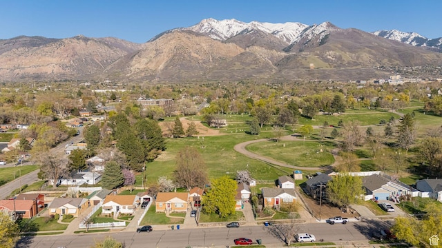 exterior space with a mountain view and a residential view