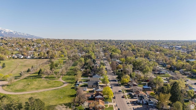 birds eye view of property with a residential view