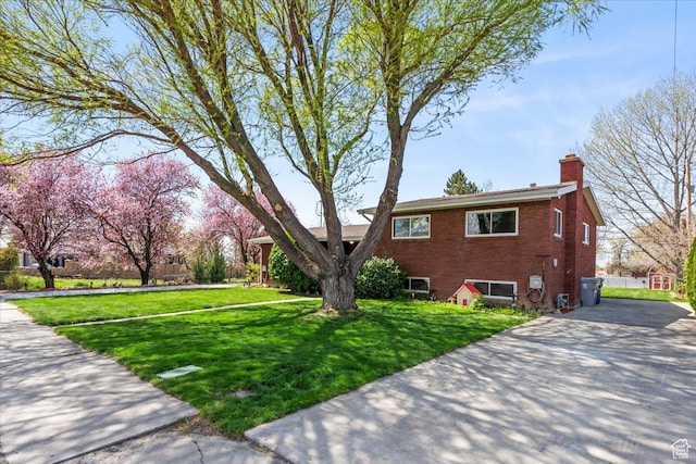 400 S 300 E, Pleasant Grove, UT 84062 - view of side of home with a yard, brick siding, fence, and a chimney