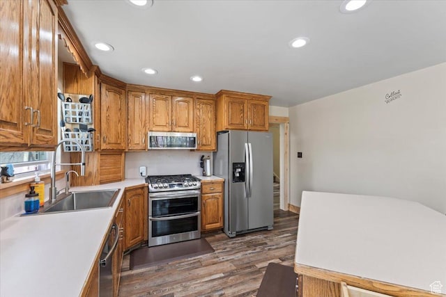 400 S 300 E, Pleasant Grove, UT 84062 - kitchen featuring dark wood-style flooring, brown cabinetry, appliances with stainless steel finishes, and recessed lighting