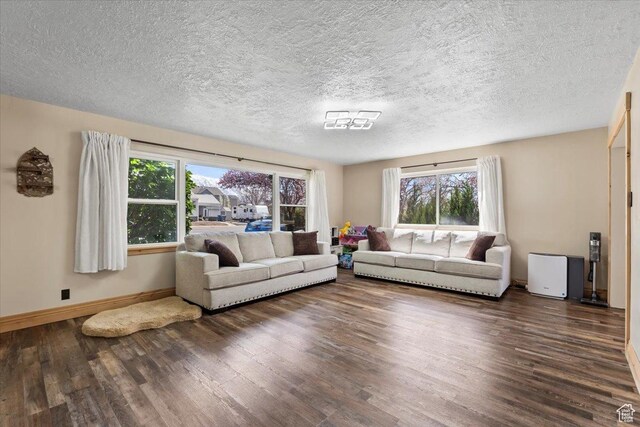 400 S 300 E, Pleasant Grove, UT 84062 - living room featuring plenty of natural light, baseboards, a textured ceiling, and wood finished floors