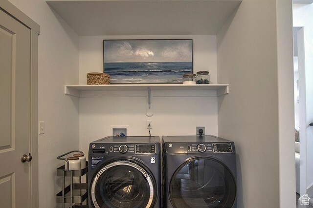 55 E Buttercup Ln Unit 42, Garden City, UT 84028 - laundry room featuring independent washer and dryer and laundry area