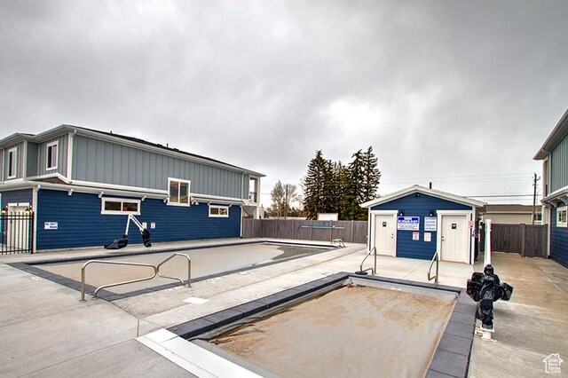 55 E Buttercup Ln Unit 42, Garden City, UT 84028 - exterior space with board and batten siding and fence