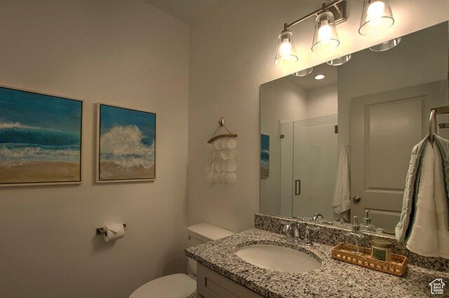 55 E Buttercup Ln Unit 42, Garden City, UT 84028 - full bathroom with a shower stall, vanity, and toilet