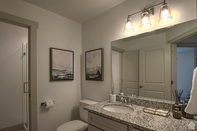 55 E Buttercup Ln Unit 42, Garden City, UT 84028 - full bath featuring a shower stall, vanity, baseboards, and toilet