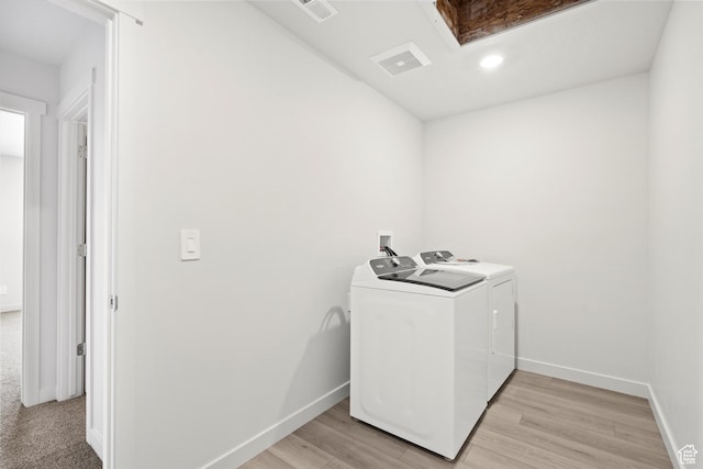 1345 N Harper Way Unit 0250, Tooele, UT 84074 - washroom featuring washer and dryer, light wood-type flooring, and recessed lighting