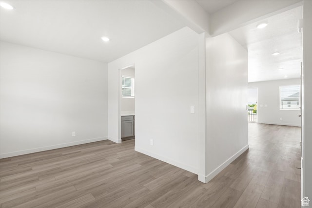 1345 N Harper Way Unit 0250, Tooele, UT 84074 - empty room with light wood-type flooring and recessed lighting