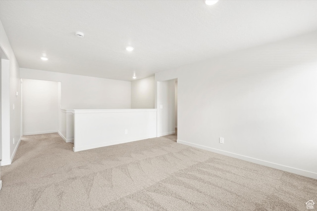 1345 N Harper Way Unit 0250, Tooele, UT 84074 - carpeted empty room featuring recessed lighting and a smoke detector