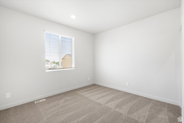 1345 N Harper Way Unit 0250, Tooele, UT 84074 - unfurnished room featuring carpet floors and recessed lighting