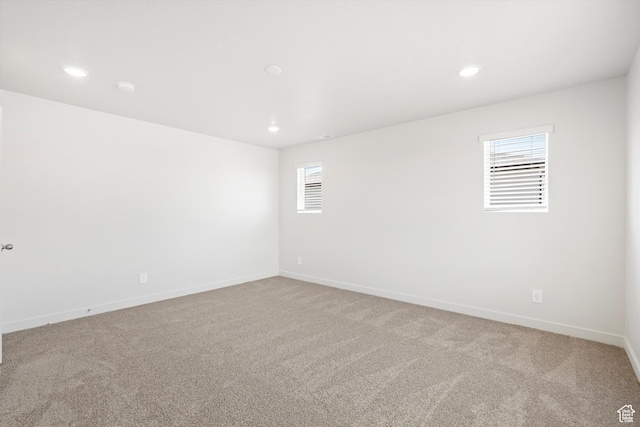 1345 N Harper Way Unit 0250, Tooele, UT 84074 - spare room with recessed lighting and light carpet