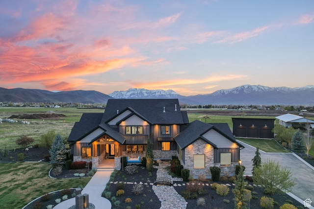 2154 E 1340 S, Heber City, UT 84032 - view of front of house featuring a porch, driveway, a mountain view, and stone siding