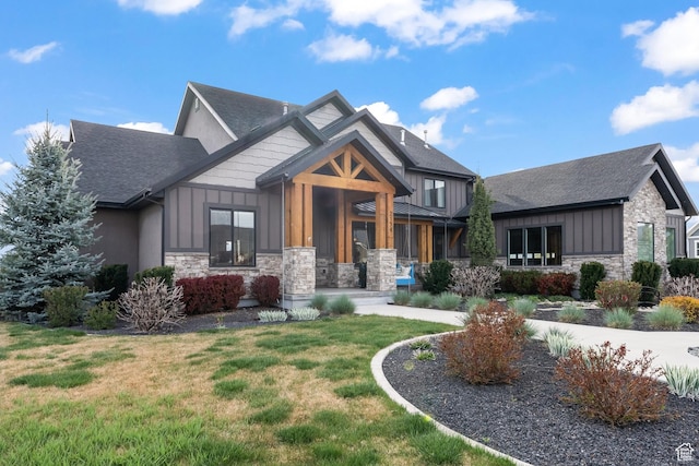 2154 E 1340 S, Heber City, UT 84032 - craftsman inspired home featuring a porch, stone siding, board and batten siding, a front lawn, and roof with shingles