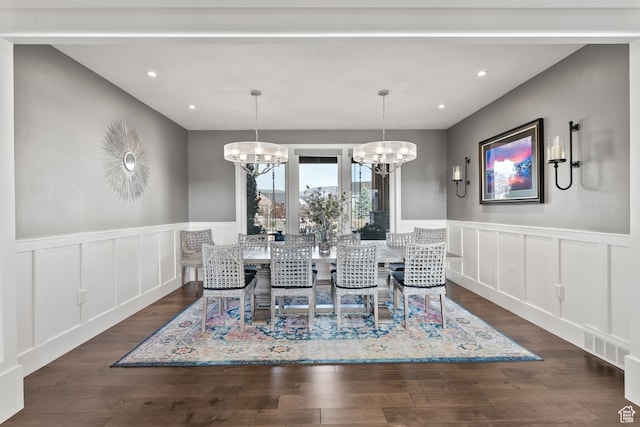 2154 E 1340 S, Heber City, UT 84032 - dining room featuring a decorative wall, a wainscoted wall, a notable chandelier, and dark wood-style flooring