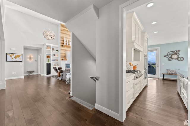 2154 E 1340 S, Heber City, UT 84032 - hallway with dark wood-type flooring, an inviting chandelier, baseboards, and recessed lighting