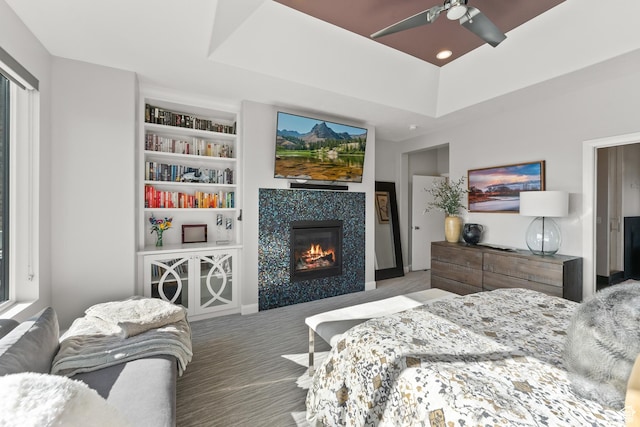 2154 E 1340 S, Heber City, UT 84032 - bedroom with a tiled fireplace, a tray ceiling, recessed lighting, and a ceiling fan