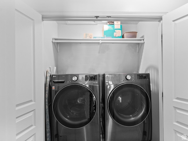 washroom with washer and dryer and laundry area