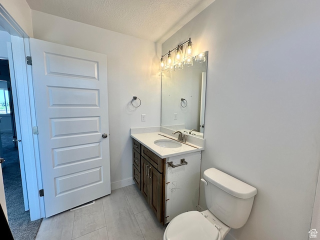 1038 W 2260 S Unit 105, Nibley, UT 84321 - half bathroom with vanity and a textured ceiling