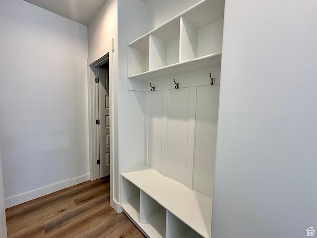 1038 W 2260 S Unit 105, Nibley, UT 84321 - mudroom featuring wood finished floors and baseboards