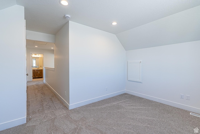 1038 W 2260 S Unit 105, Nibley, UT 84321 - bonus room featuring carpet, recessed lighting, and lofted ceiling