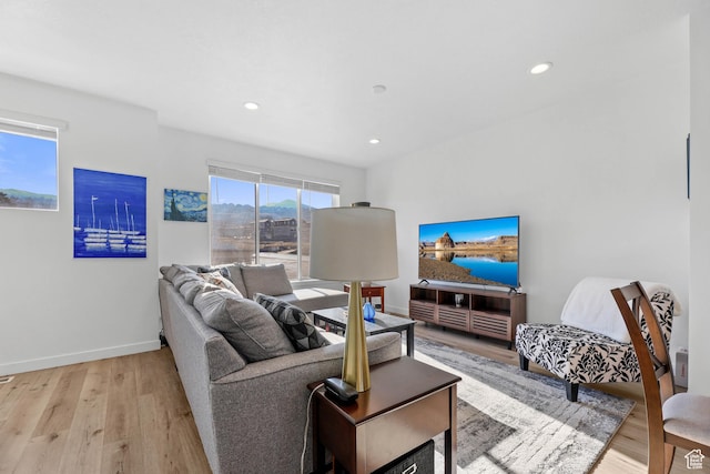 25 E Center Unit 10, North Salt Lake, UT 84054 - living area with light wood finished floors, baseboards, and recessed lighting